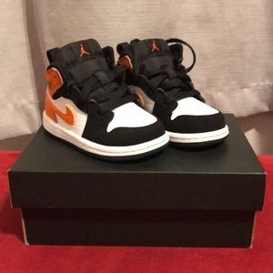 Black and Orange Jordan 1’s